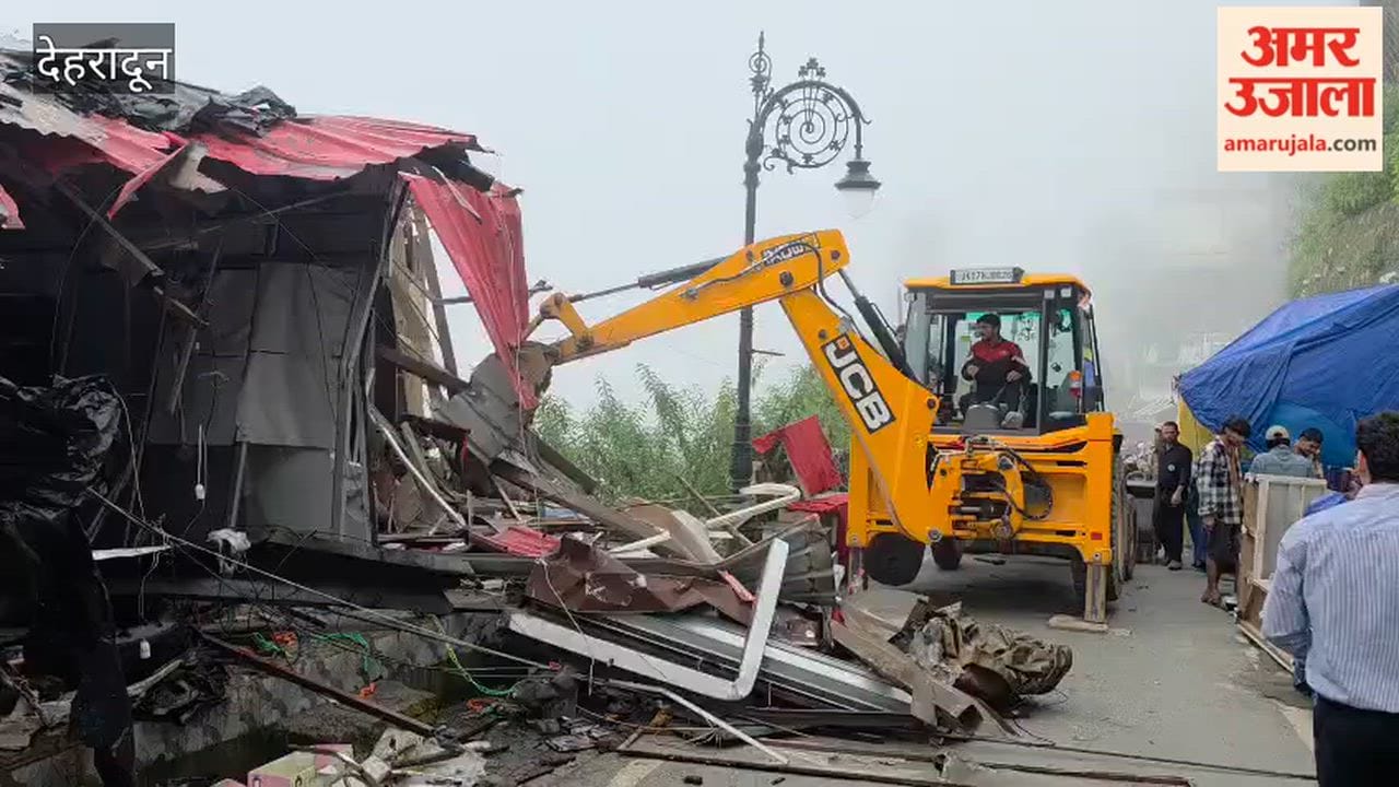 Mussoorie Bulldozer rolls onto Upper Mall Road illegal shops demolished