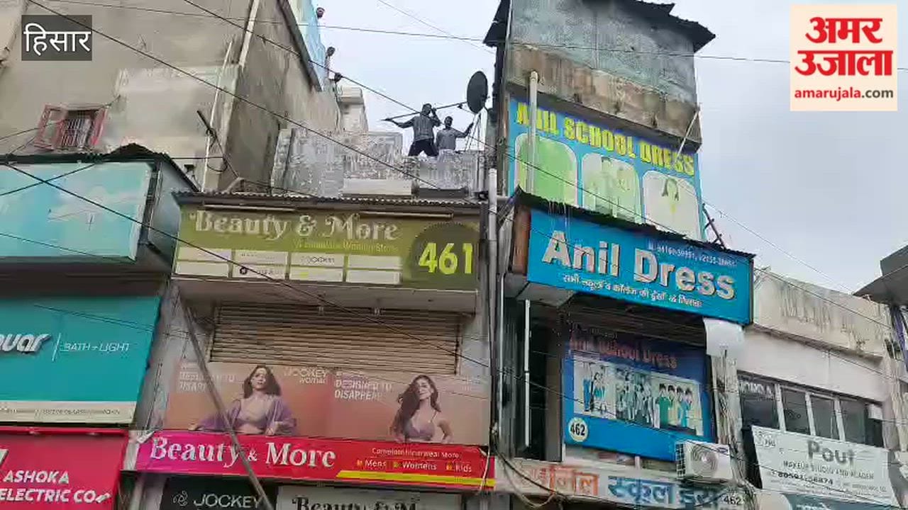 Fire breaks out at a school uniform shop in Hisar's Rajguru Market.