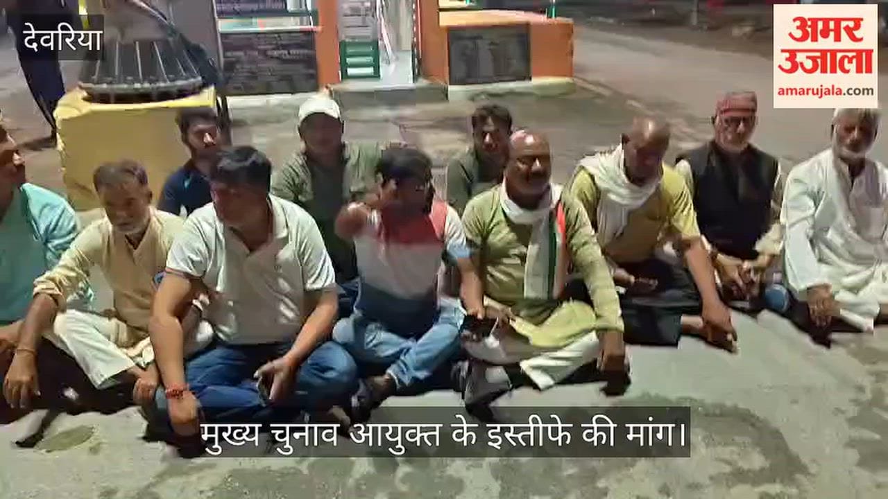 Congress members stage a sit-in protest against the detention of Rahul Gandhi.