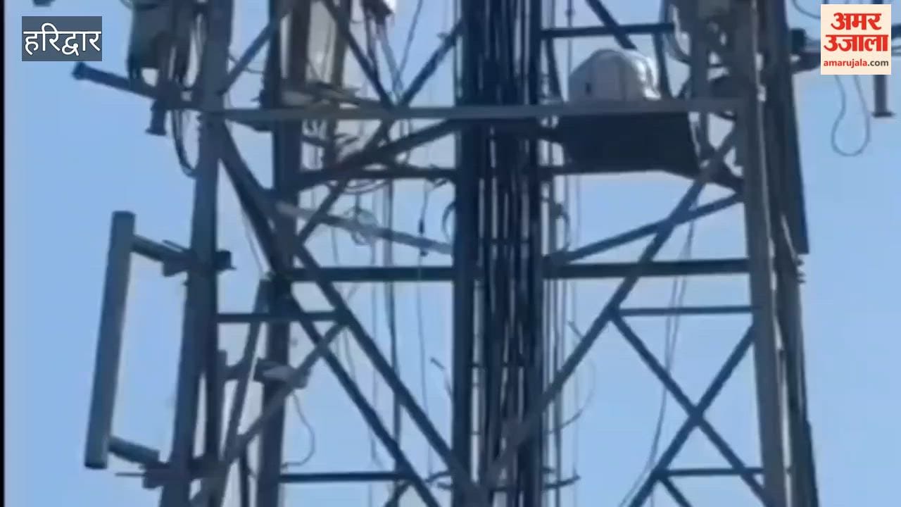 Man from Banaras climbs mobile tower in anger after a rift with his wife.