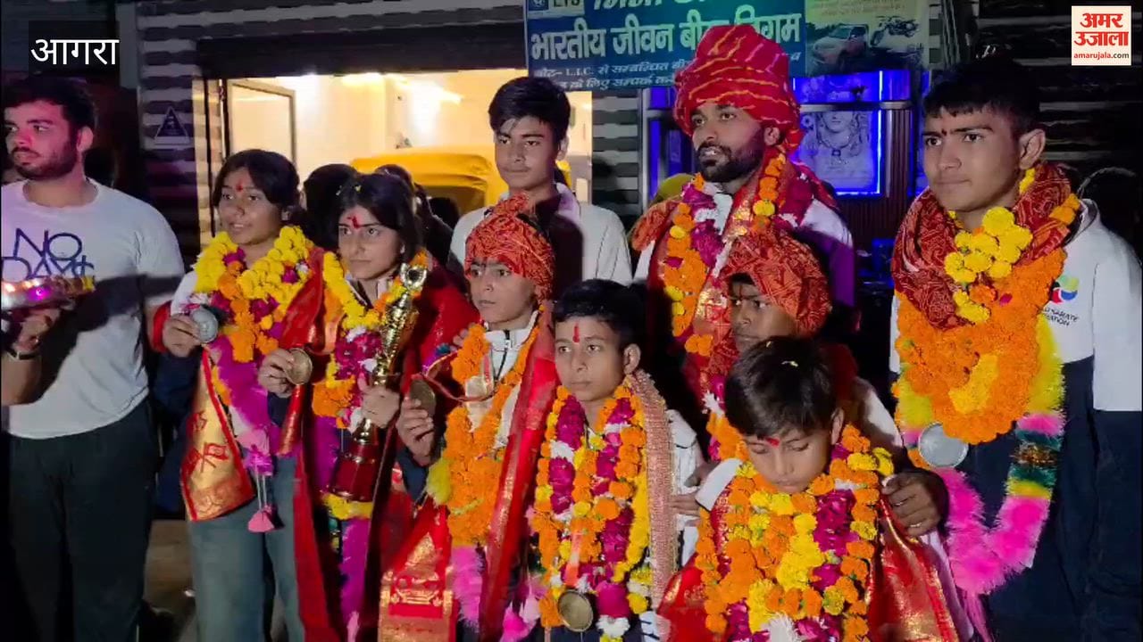 Upon their return from Bhutan, the sons and daughters who won gold and silver medals were welcomed with a *tilak* and *aarti*, and adorned with flower garlands.