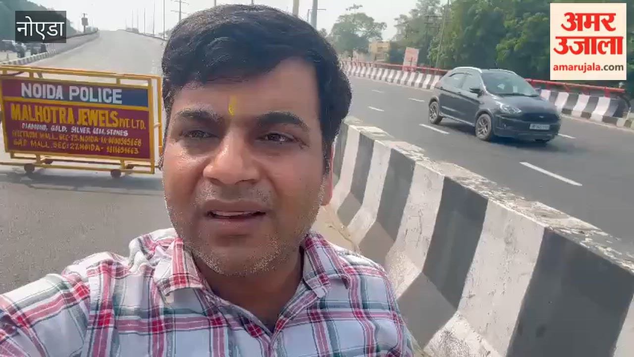 Traffic affected due to a pothole opposite Noida Sector 33